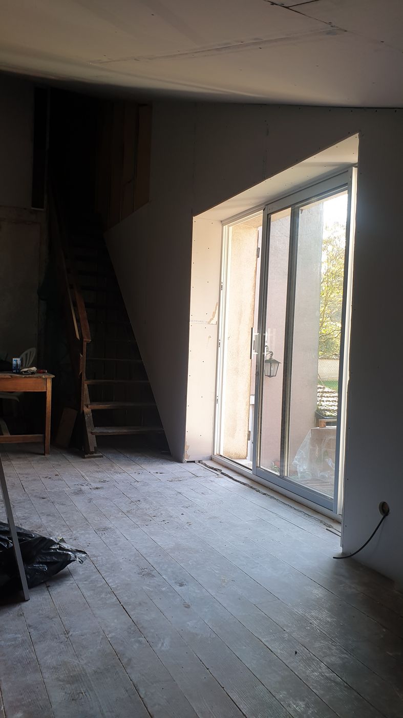 Rénovation à Nancy — Piece mansardee baie vitree parquet