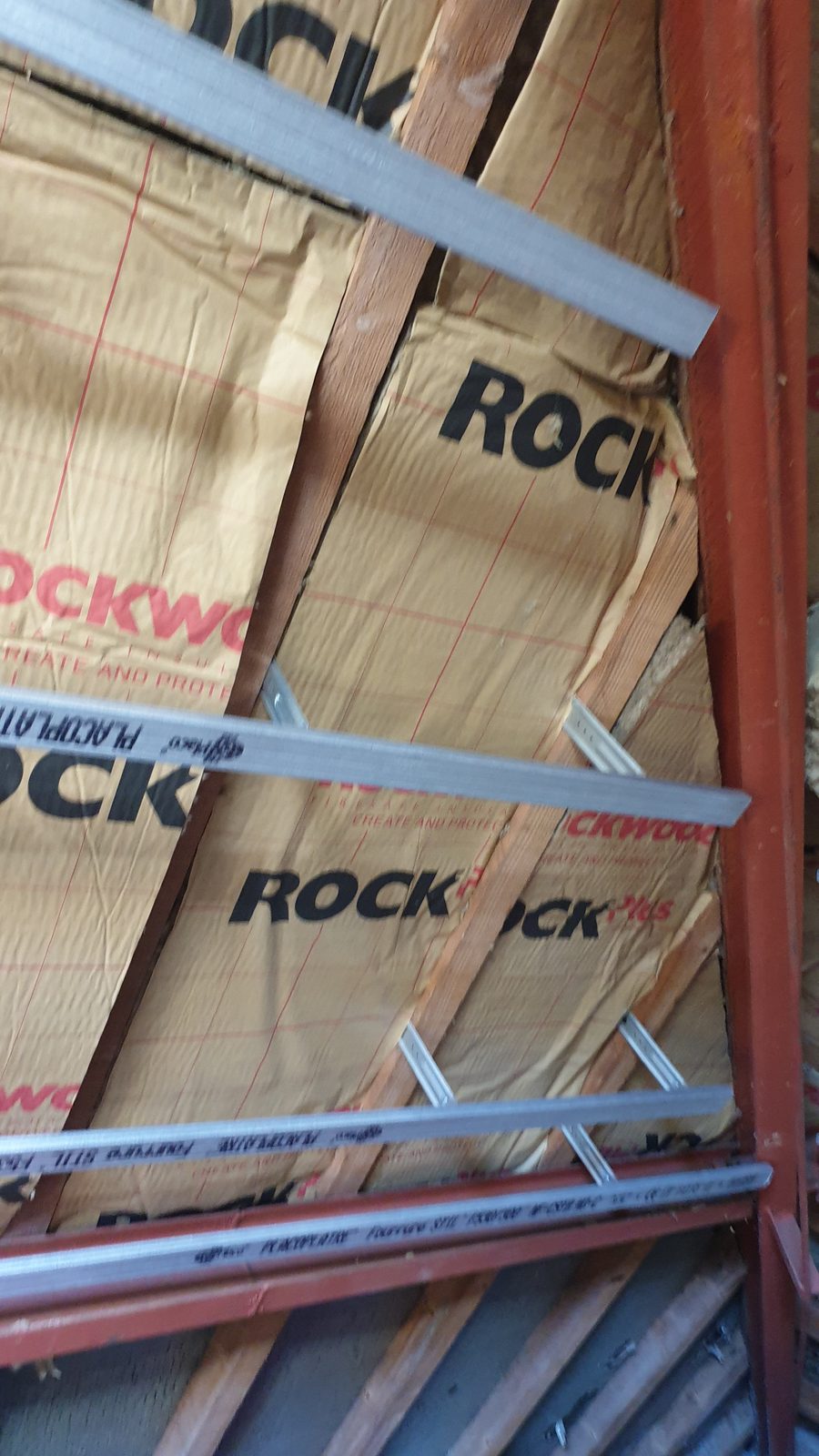 Pose de panneaux de laine de roche Rockwool